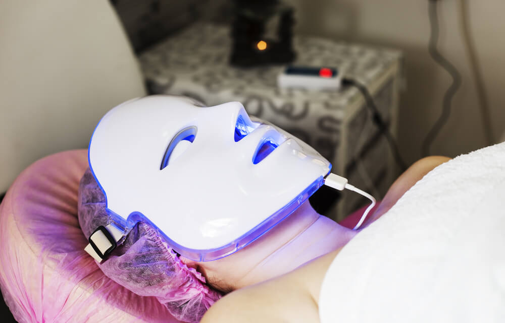 blue light LED mask person undergoing blue Opera mask Therapy